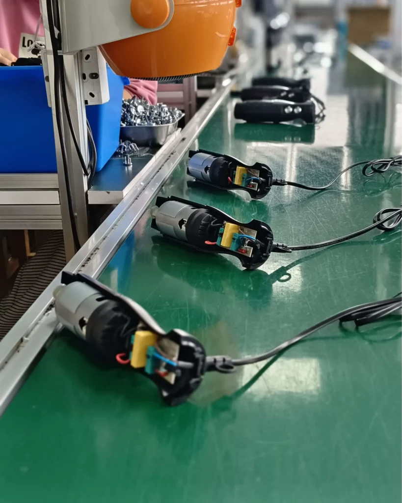 Hand blender and immersion blender component assembly in factory