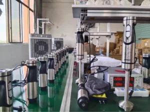 Testing hand blenders and immersion blenders on a quality control line.